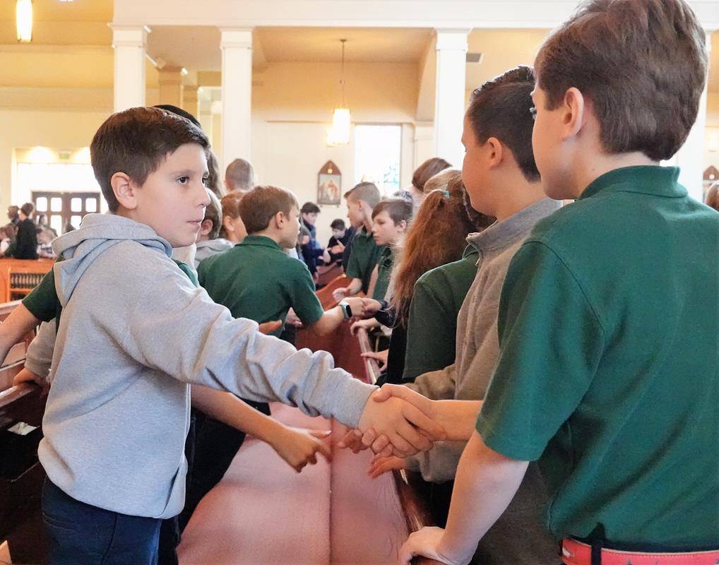 St. Mark School had an all school Mass Jan. 29 to celebrate faith appreciation day for Catholic Schools Week. Father Patrick Winslow, vicar and chancellor of the Diocese celebrated the Mass, which was a votive Mass for St. Joseph (Provided by Amy Burger)
