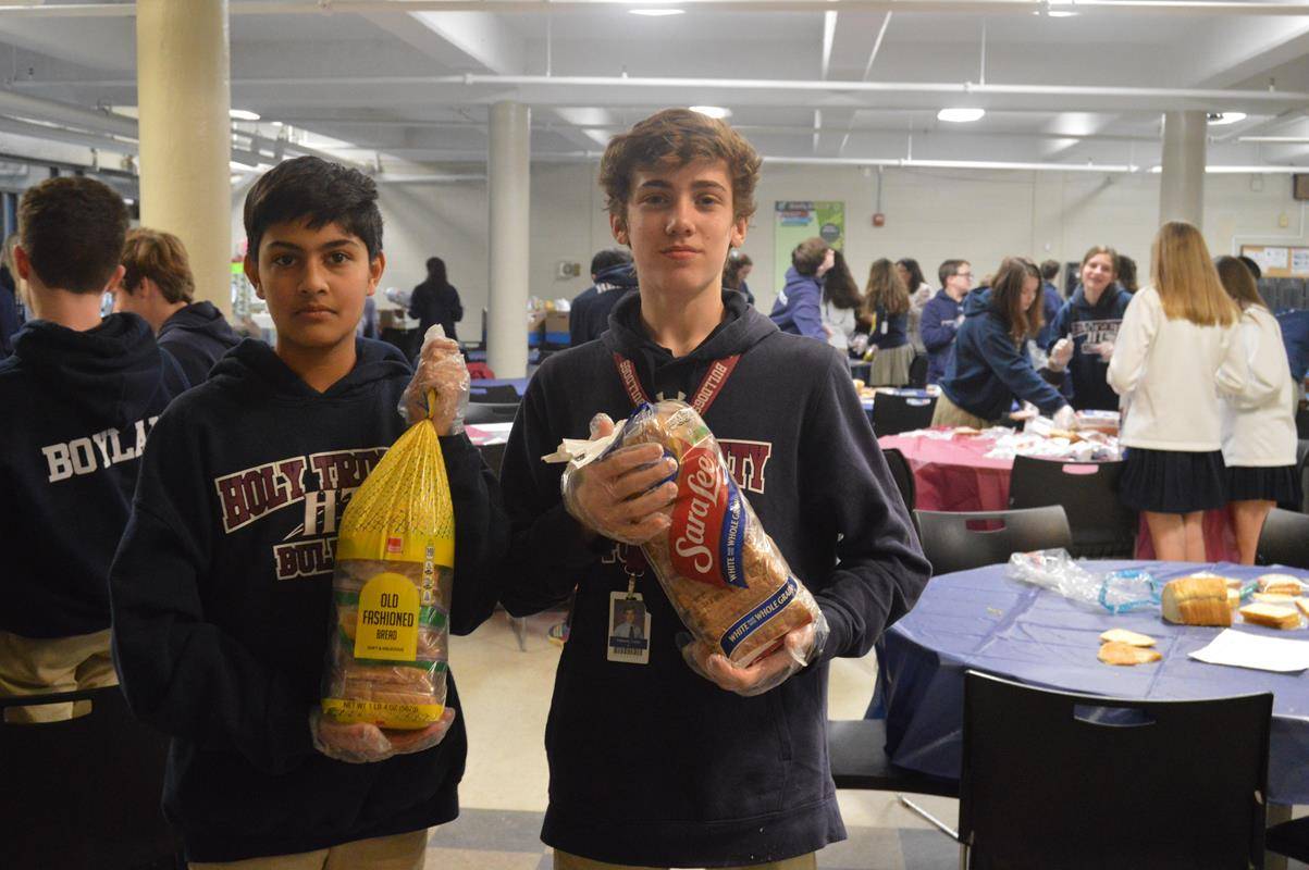 Eighth graders at Holy Trinity Middle School mads sandwiches as a service project for the homeless. (Photo provided by Lisa Michalski-Gilkey)