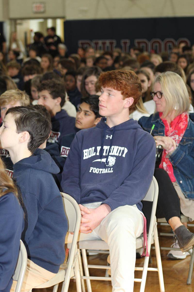 Officer Peter Grant, a Charlotte Catholic High School alum, spoke at a school wide assembly about social media safety. (Photo provided by Lisa Michalski-Gilkey)