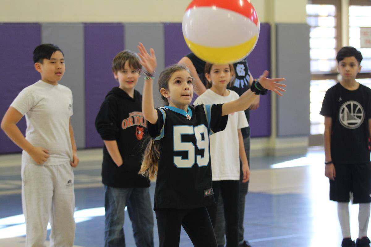 St. Ann School in Charlotte celebrated Catholic Schools Week with a student/teacher volleyball game in the gymnasium. St. Ann School band students provided pep music during the game.(Photos by SueAnn Howell, Catholic News Herald)