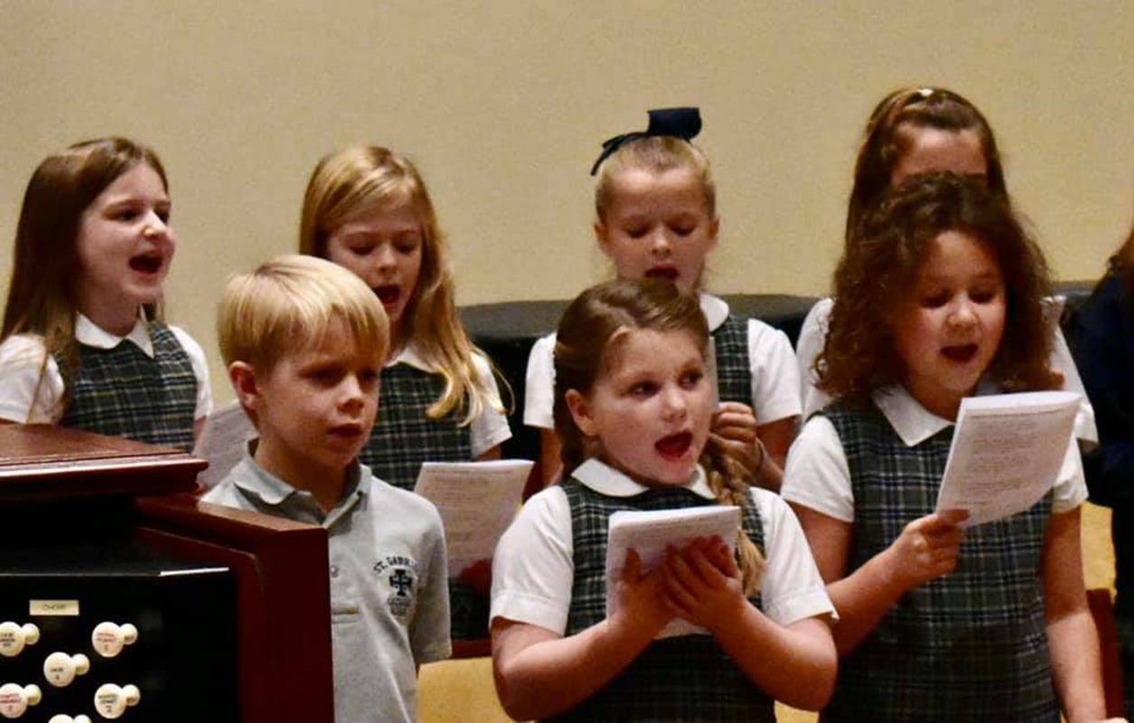 St. Gabriel School choir sang at the parish’s Vigil Mass to start Catholic Schools week. (Photos via Facebook)
