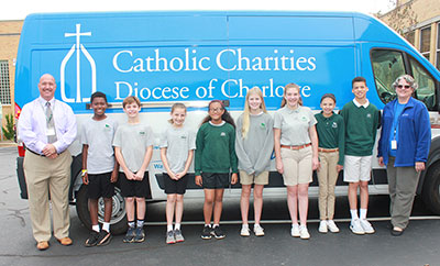 101618 CC donations at St Leo School