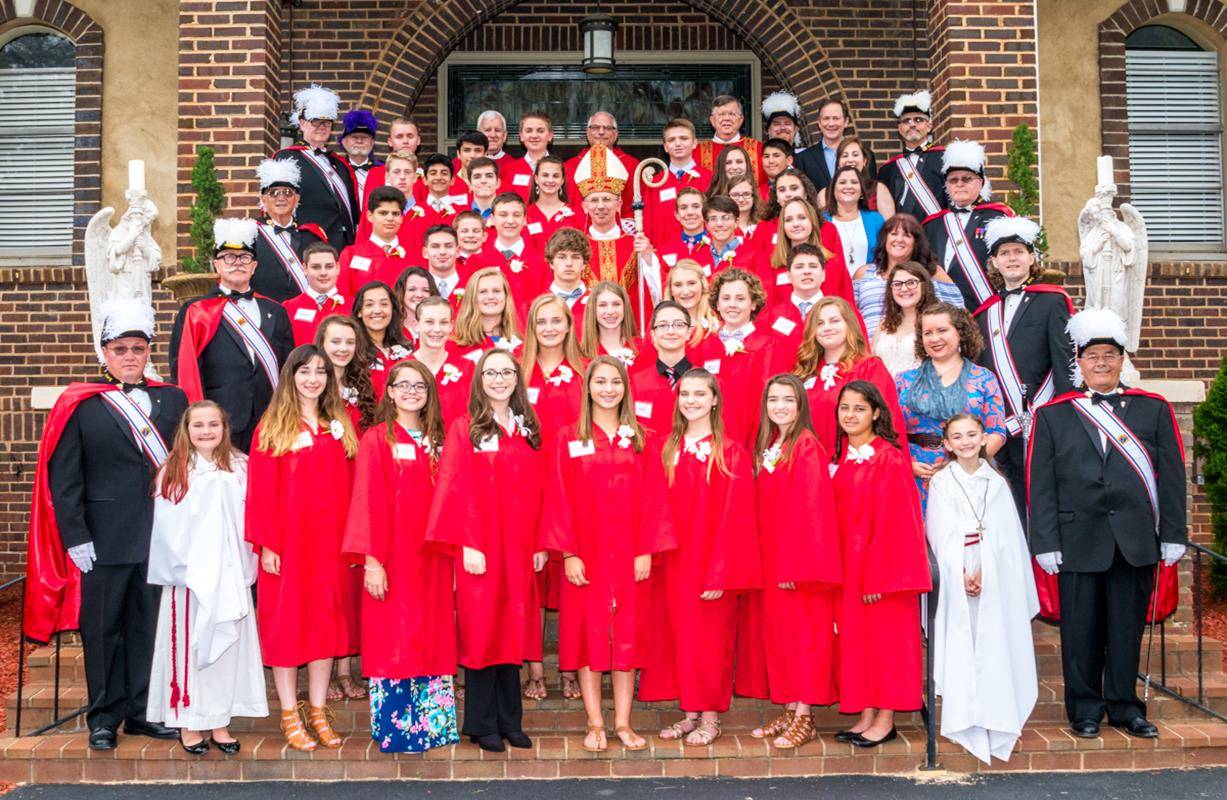 DENVER — Youth at Holy Spirit Church recently received the sacrament of confirmation, during Masses offered May 6 by Father Carmen Malacari, pastor, and May 11 by Bishop Peter Jugis. (Photos by Doreen Sugierski | Catholic News Herald)