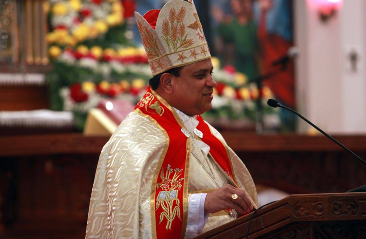 Auxiliary Bishop Joy Alappatt of the St. Thomas Syro-Malabar Eparchy of Chicago speaks before the start of Mass to dedicate St. Mary's Syro-Malabar Catholic Church in Charlotte July 22.