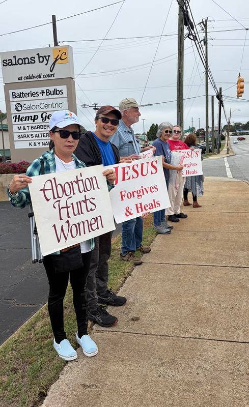 Parishioners from Our Lady of Grace and St. Pius X parishes in Greensboro were joined by the Knights of Columbus and Boy Scouts  to stand up for life in their city.