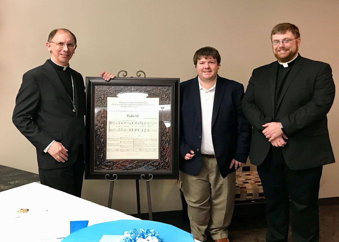 Andrew O'Connor, parish music director, composed music for Psalm 63 for the installation Mass. Pictured with him are Bishop Peter Jugis and Father Paul Buchanan. (Photo by Barbara Markun)