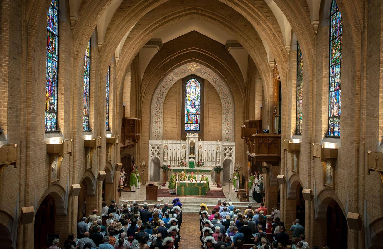Our Lady of Grace Church in Greensboro was filled Sept. 2 to witness the installation of its 14th pastor (Photos by Jarek Lucek)