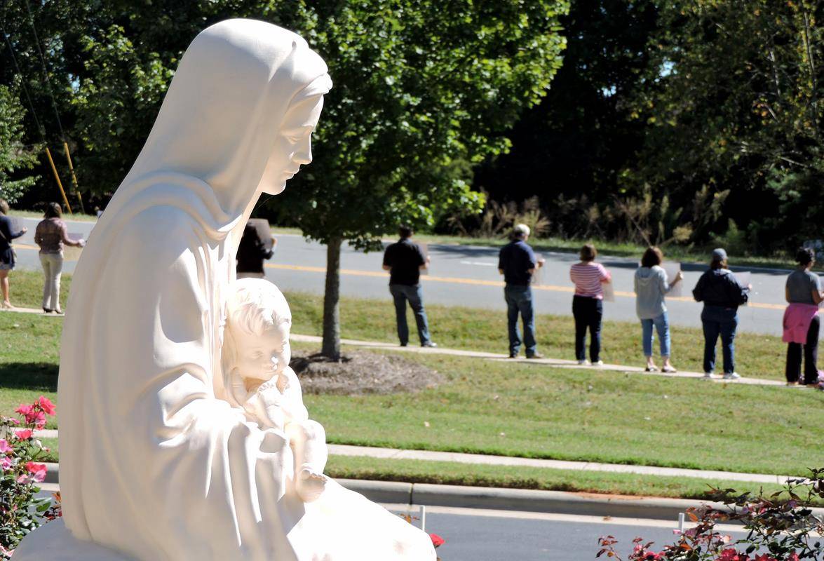 Faithful gather at St. Mark in Huntersville.