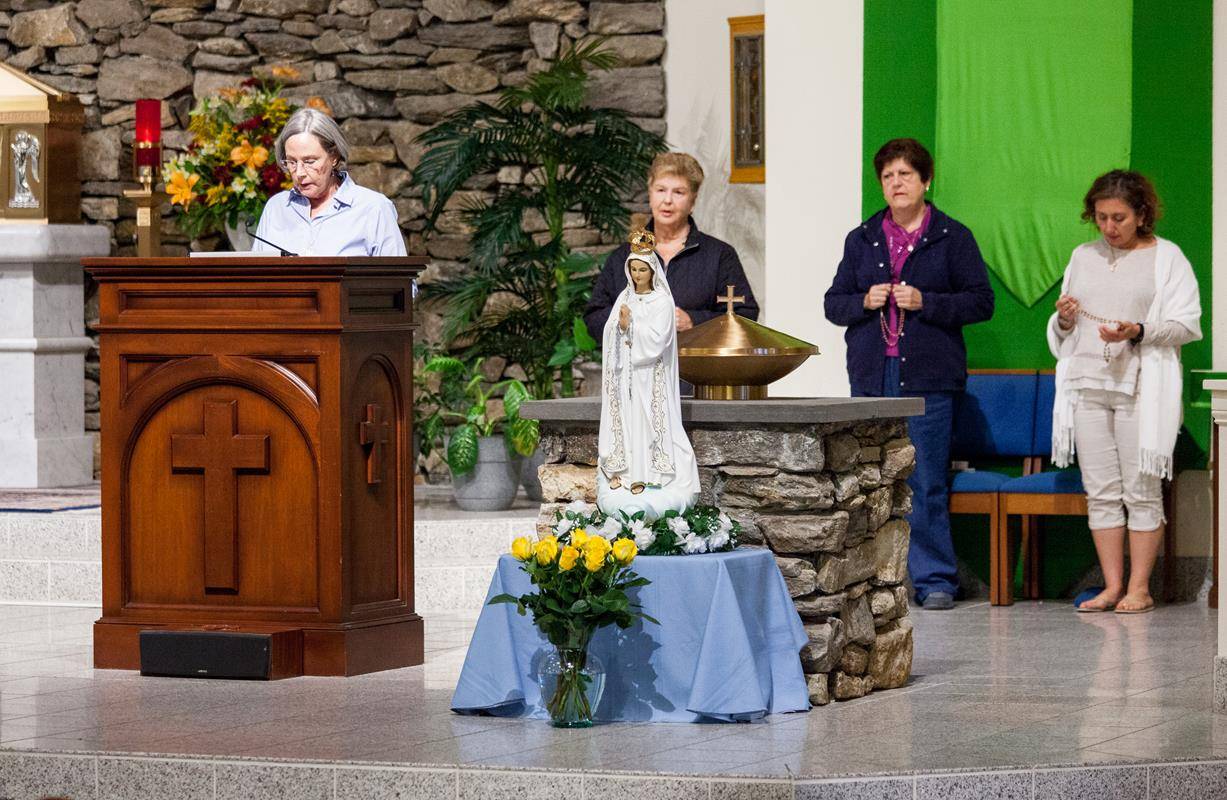 In Hendersonville, parishioners at Immaculate Conception Church welcomed a statue of Our Lady of Fatima for two Masses, after which they prayed the rosary. Photos by Paul Vincent Photography