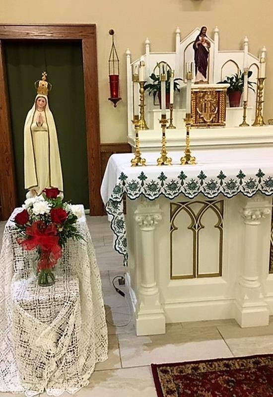 An evening bilingual Mass was offered Oct. 13 at St. Francis of Assisi Church in Jefferson to honor the 100th anniversary of Mary’s appearance to the shepherd children at Fatima. Photo by Patrick Hession, Catholic News Herald