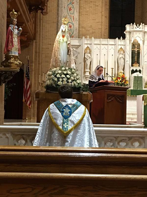 At Our Lady of Grace Church in Greensboro, parishioners and Father Paul Buchanan, pastor, welcomed the International Pilgrim Image of Our Lady of Fatima Oct. 6. Photos provided by Eileen Rohan