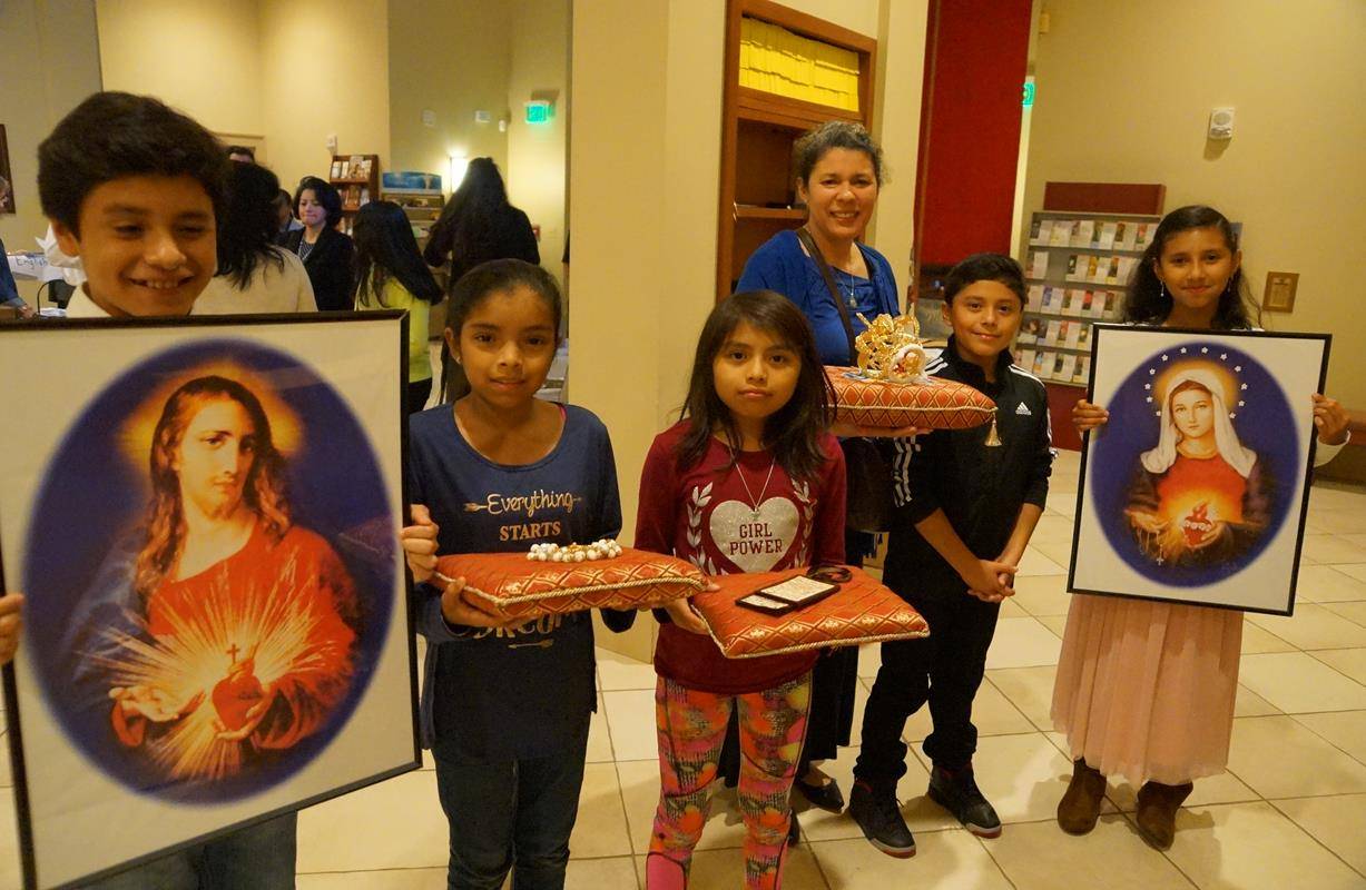 A candlelight procession around the church followed the evening Mass. Photos by John Cosmas, Catholic News Herald