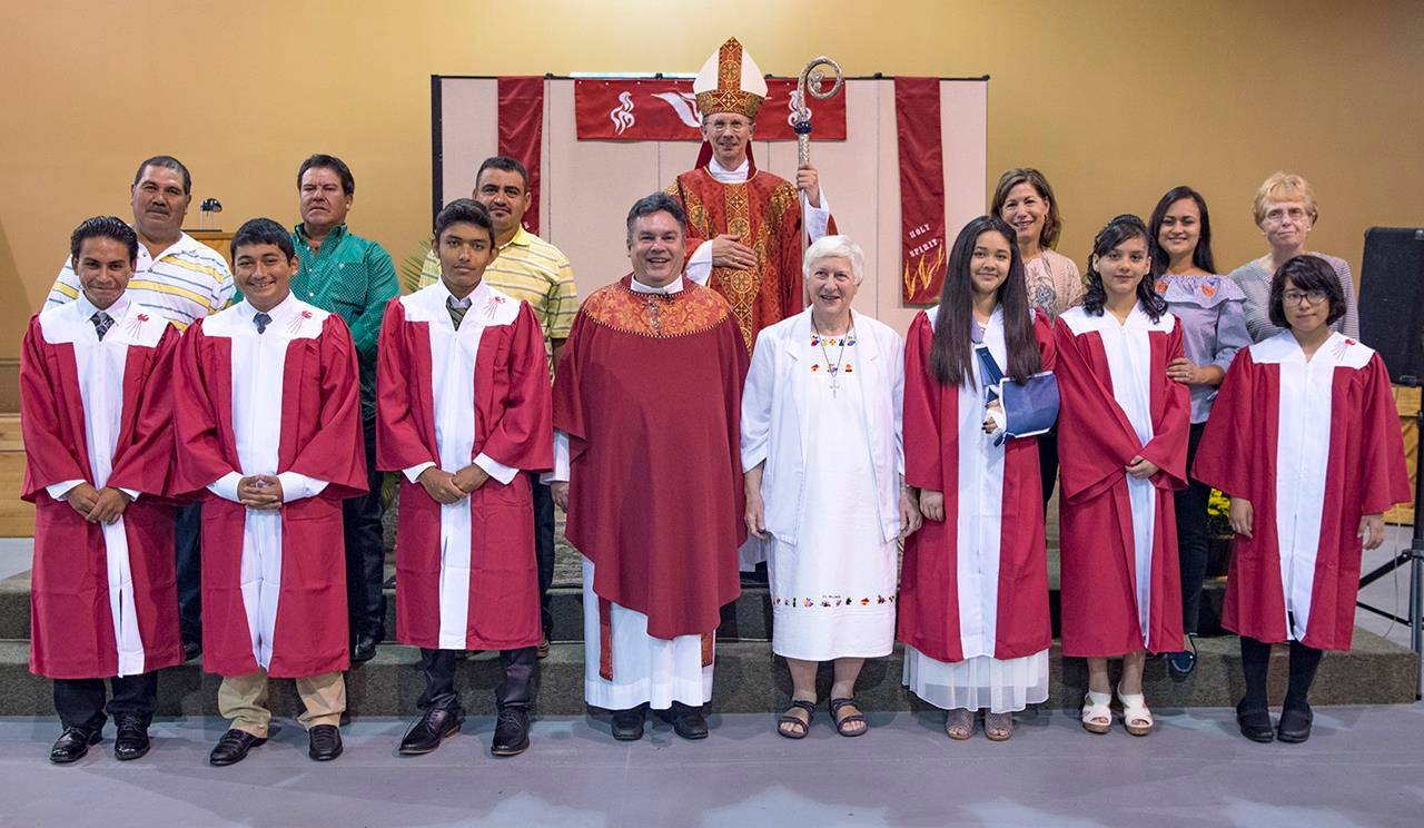 HAYESVILLE — Bishop Peter Jugis conferred the sacrament of confirmation on six youth at Immaculate Heart of Mary Mission in Hayesville Sept. 17. The parish celebrated with a brunch following the 9 a.m. Mass. Pictured are (front row): confirmandi Jose Con
