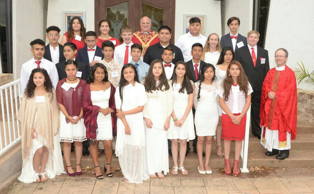 REIDSVILLE — Twenty-five young members of Holy Infant Church recently received the sacrament of confirmation during Mass celebrated by Monsignor Anthony Marcaccio, pastor of St. Pius X Church in Greensboro, and Father Frank Seabo, pastor. (Photo PROVIDED
