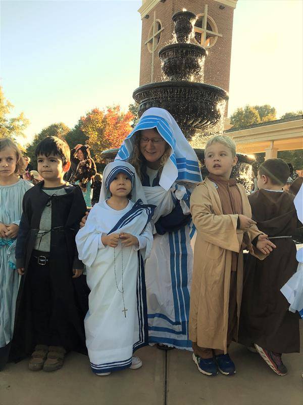 They paraded from their classrooms, to the fountain and then back to the classrooms for parties.
