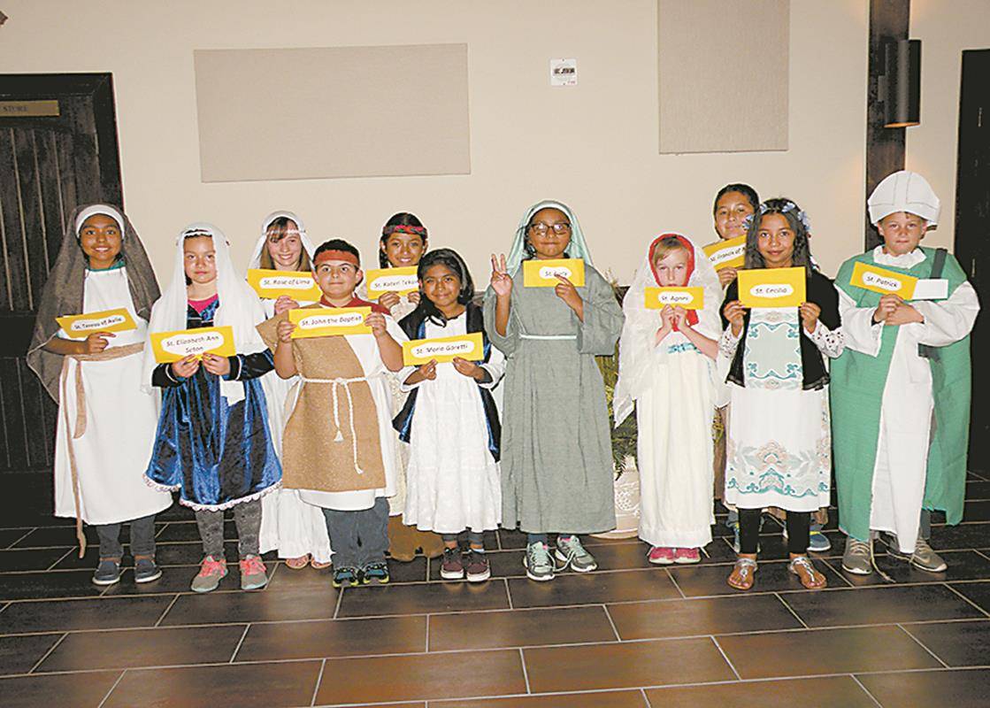 HAYESVILLE — On All Saints Day, Immaculate Heart of Mary Mission’s faith formation students presented a “Celebration of the Saints” before Mass. Each student chose a saint to research, dressed up like them, and presented a biography to the congregation.