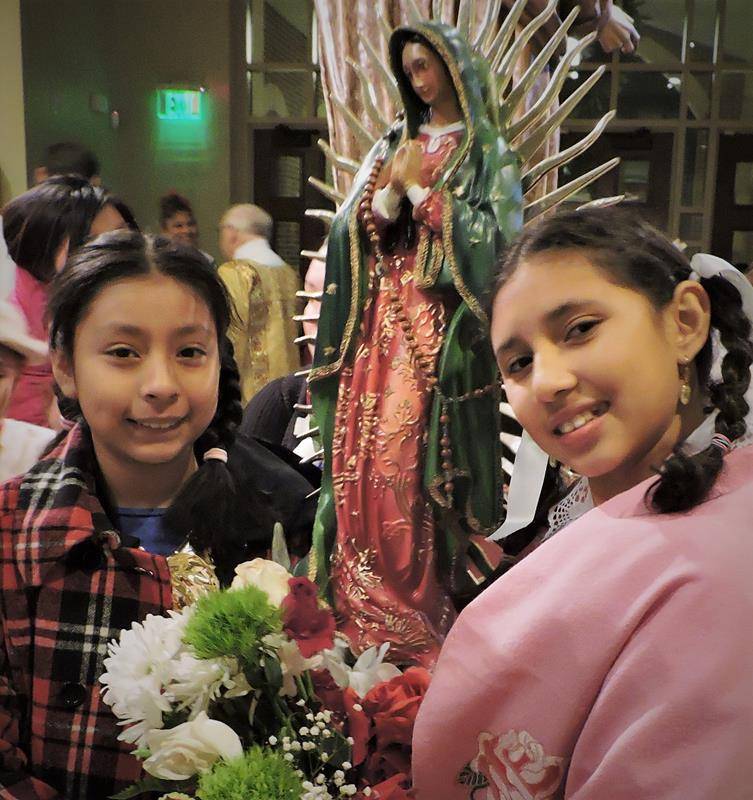 The evening began with a Rosary and talk in the Family Center and then a procession into the church for Mass. Father John Putnam was the celebrant with Father Wilson Gonzalez as the concelebrant. (Photos provided by Amy Burger)