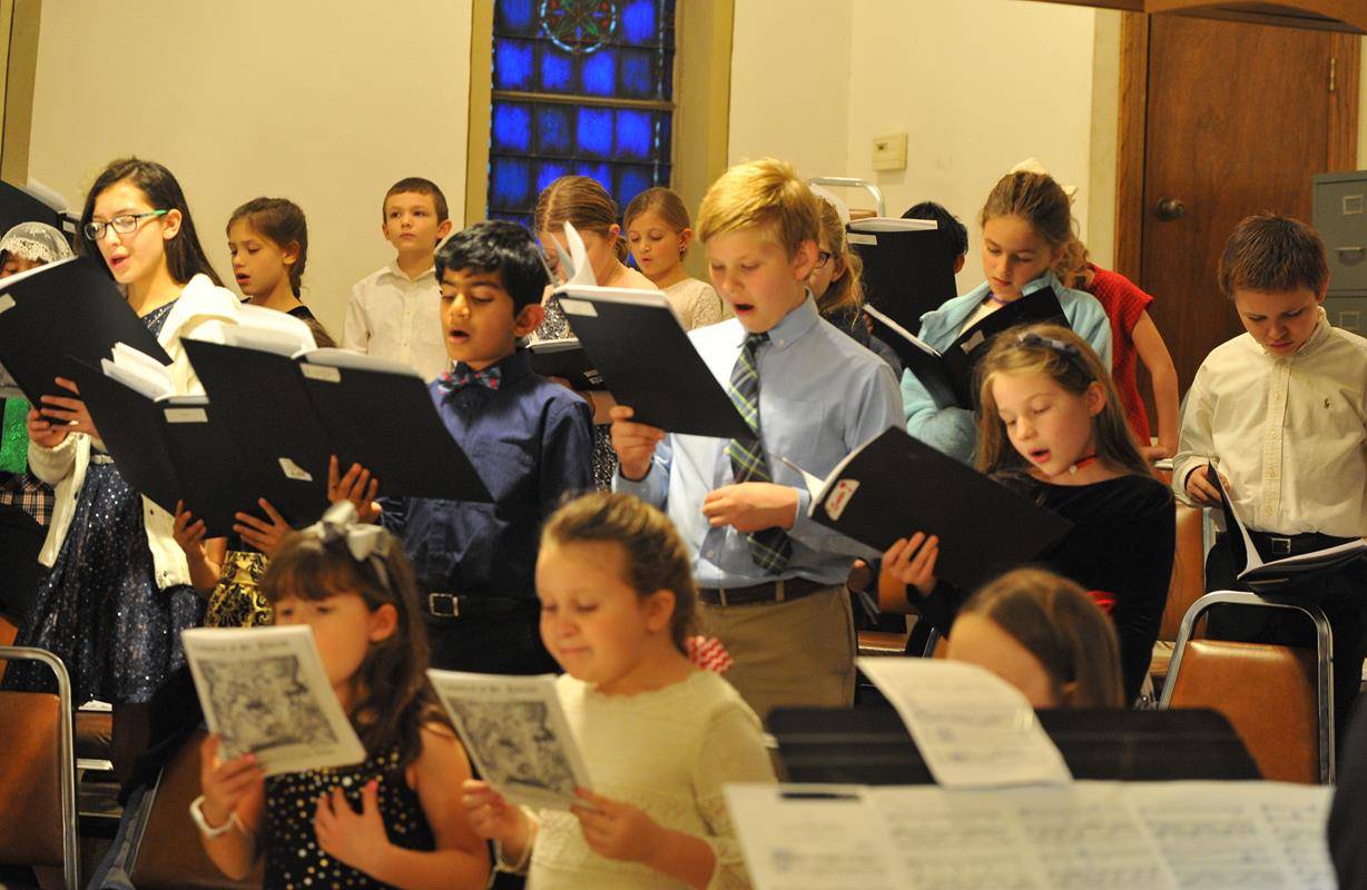 The children’s choir at St. Patrick Cathedral in Charlotte sang during the Christmas Eve children’s Mass.  (Photo provided by Markus Kuncoro)