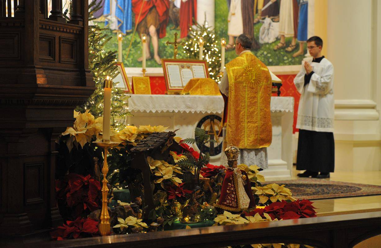 St. Ann Church in Charlotte celebrated a Mass in the Extraordinary Form at midnight Dec. 25. An estimated crowd of more than 350 faithful attended the High Mass offered by Father Timothy Reid, pastor. (Photo provided by Mike FitzGerald and Markus Kuncoro)