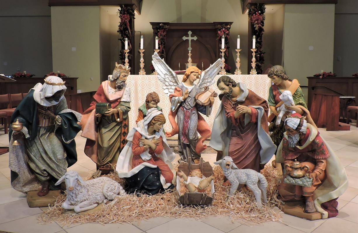 HUNTERSVILLE — Seminarians helped St. Mark Church add the wisemen, Caspar, Melchoir and Balthazer to the nativity for Epiphany. The heavy Fontanini statues stand 50 inches tall and are made of marble and resin. (Photos provided by Amy G. Burger)