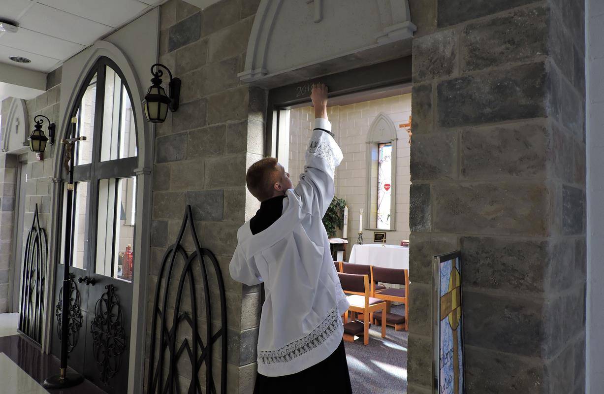 HUNTERSVILLE — All of the doors of St. Mark Church, Family Center, St. Mark School and Christ the King School. (Photos provided by Amy G. Burger) 