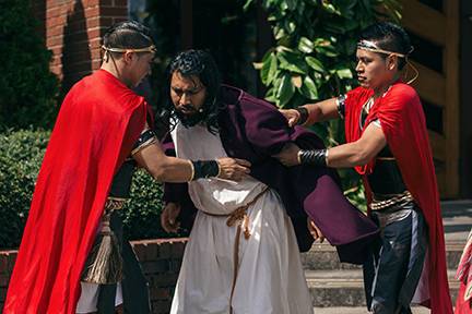 Scene from the Via Crucis staged at St. Charles Borromeo Church in Morganton (Photo by Lorenzo Pedro, correspondent)