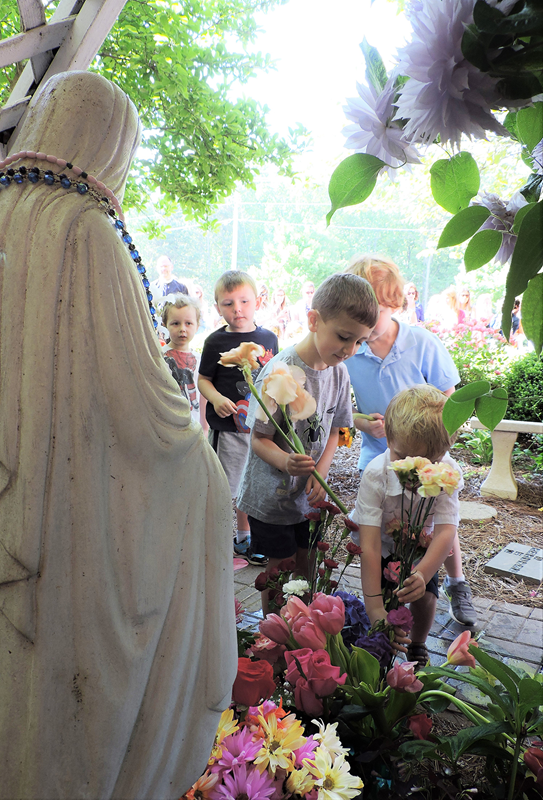 St. Mark School and Parish are also celebrating May Crownings this month. (Photos provided by Amy Burger)