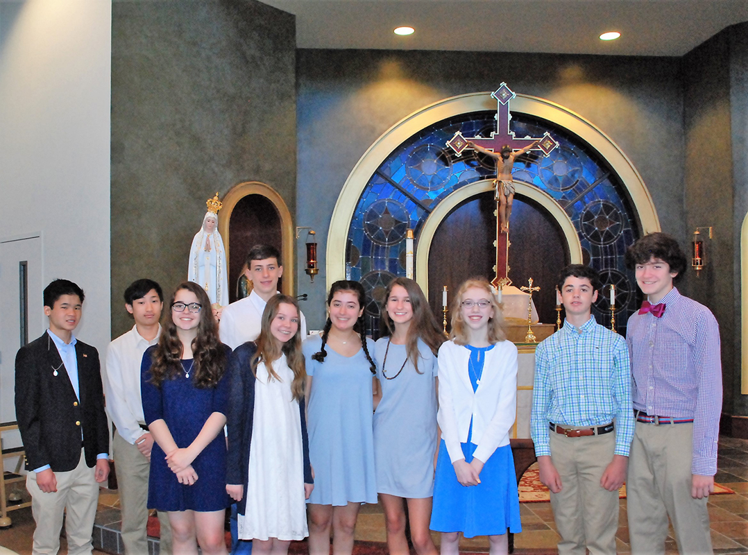 CHARLOTTE — Charlotte Catholic High School held its annual May Crowning May 1 in the school chapel. In the Church’s tradition, the Blessed Virgin Mary is honored as “the Queen of May. (Photo provided by Carolyn Kramer Tillman)