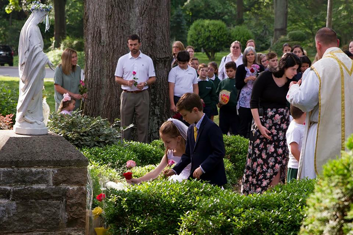 St. Michael School held its May Crowning May 11. Father Matthew Buettner, pastor, and Father Jason Christian led a procession from church to the school’s statue of the Blessed Virgin Mary. (Photo provided by Tammy Eason)