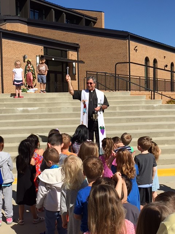 MOOREVILLE — Little Way Preschool at St. Therese Church celebrated a May Crowning May 1 with Father Mark Lawlor, pastor. (Photo provided by Lisa Cash)