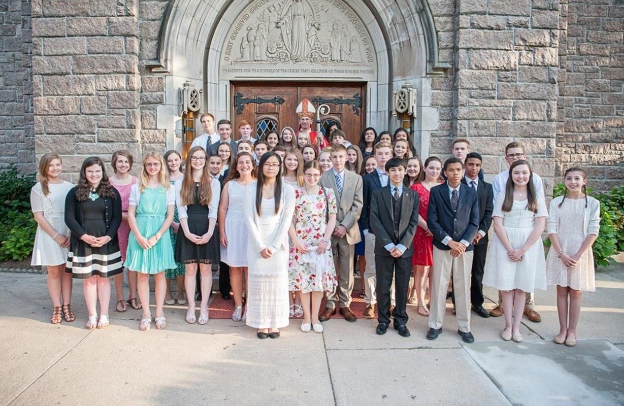 Bishop Peter Jugis administered the sacrament of confirmation to more than 40 young people at Our Lady of Grace Church May 11