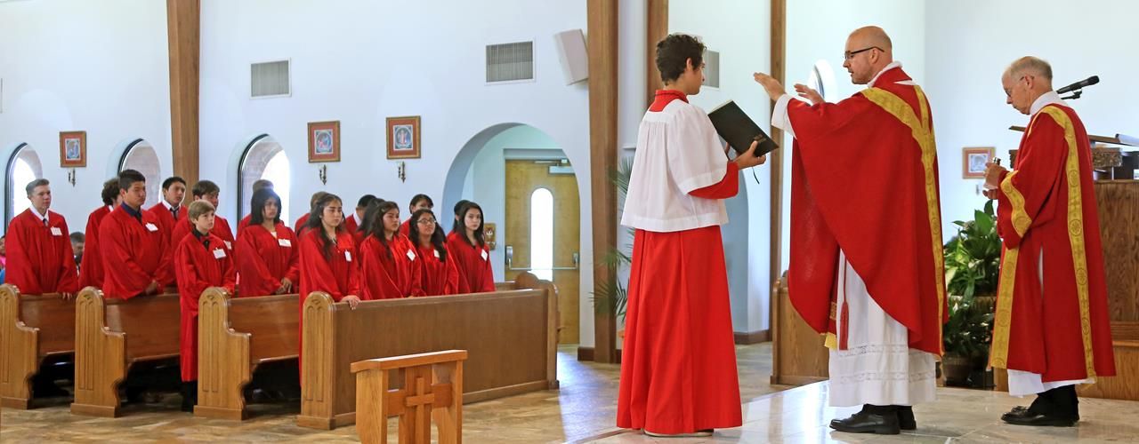 Nineteen youths at St. Mary Help of Christians Church received the sacrament of confirmation June 12 during a Mass celebrated by Father Michael Kottar, pastor
