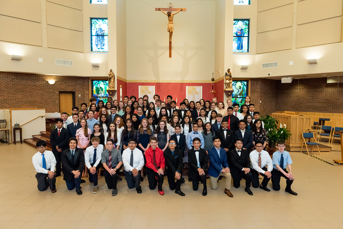 CLEMMONS — Eighty-seven young people received the sacrament of confirmation at Holy Family Church during a May 4 Mass celebrated by Monsignor Mauricio West, vicar general and chancellor of the Diocese of Charlotte. (Photo provided by Peggy Schumacher)