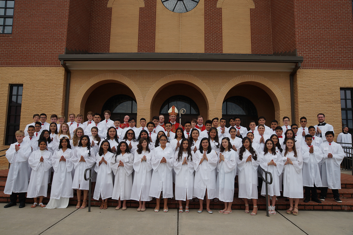 SALISBURY — Young people at Sacred Heart Church received the sacrament of confirmation in May from Bishop Peter Jugis. (John Cosmas | Catholic News Herald)