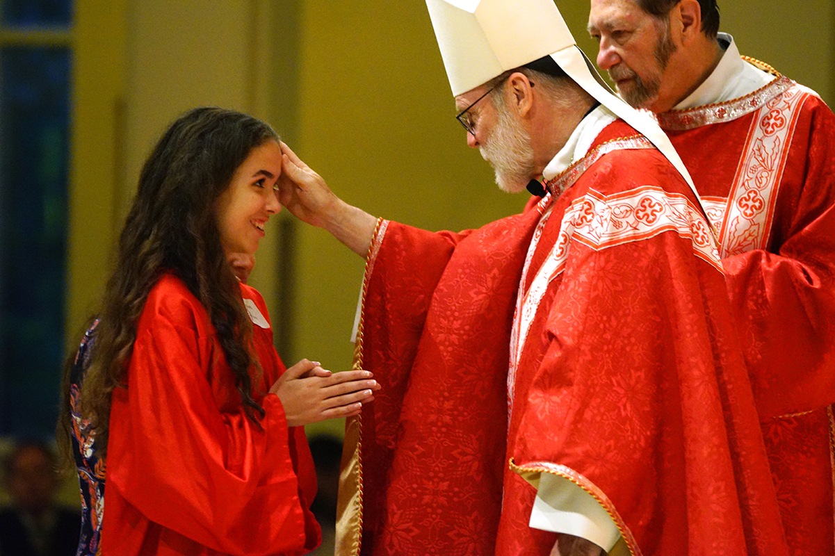 HUNTERSVILLE — An astounding number of teenagers – 227 – received the sacrament of confirmation during Masses May 26 and May 29 at St. Mark Church celebrated by Benedictine Abbot Placid Solari of Belmont Abbey. (Photos by John Cosmas and Amy Burger | Cat