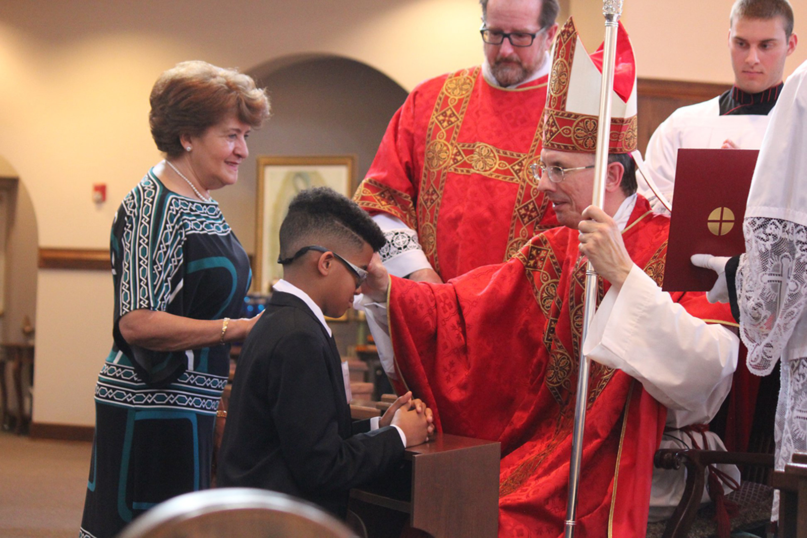 GASTONIA — Bishop Peter Jugis recently administered the sacrament of confirmation on young parishioners of St. Michael Church. Also pictured are Father Matthew Buettner, former pastor, and Father Jason Christian, former parochial vicar. (Photo via Faceboo