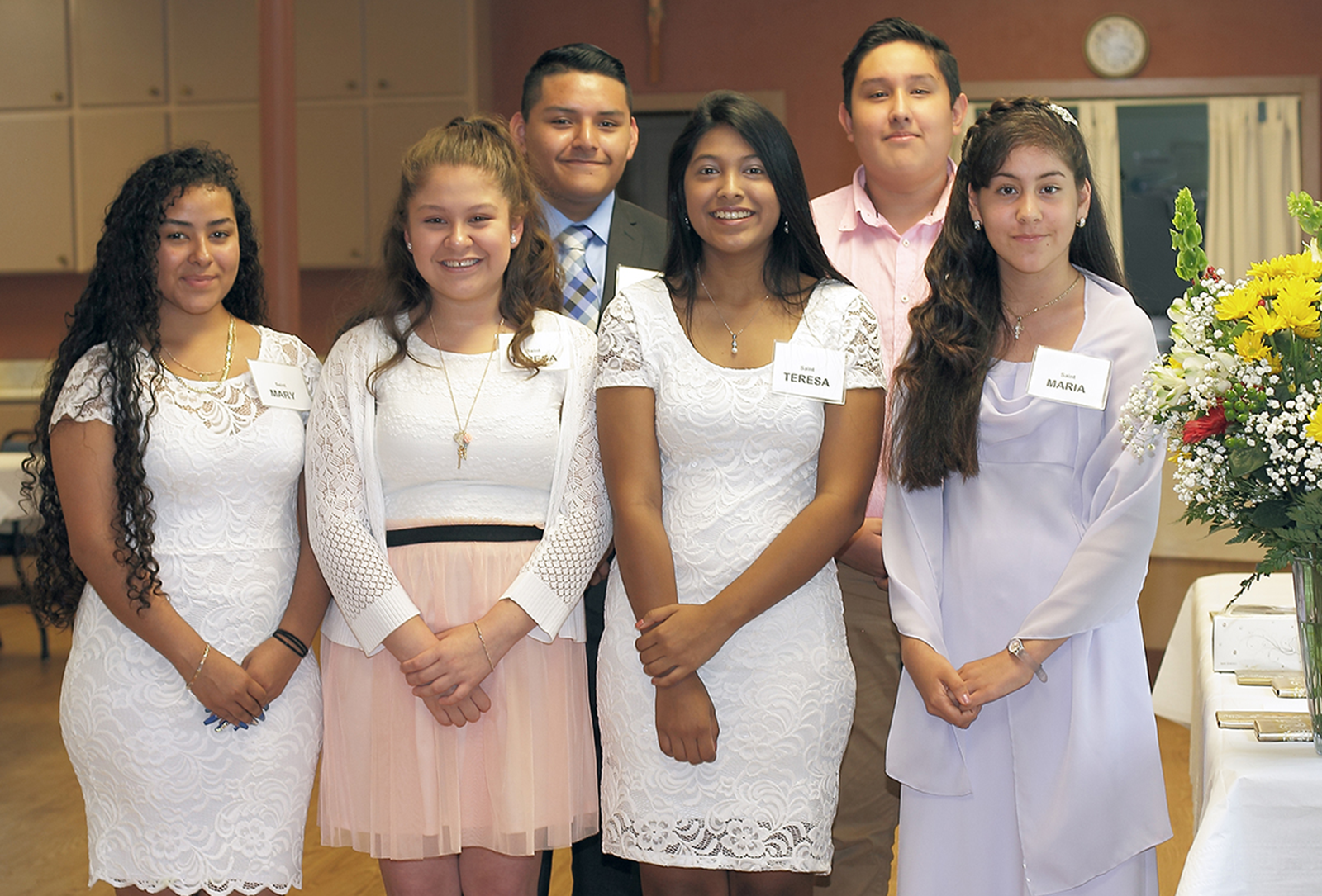 TRYON — Six young people were confirmed June 30 by Bishop Peter Jugis at St. John the Baptist Church. Pictured are Daisy Alviar, confirmed as St. Teresa, Rosalinda Cortez as St. Teresa, Alexis Garcia as St. John, Medalin Hernandez as St. Mary, Maribel Man