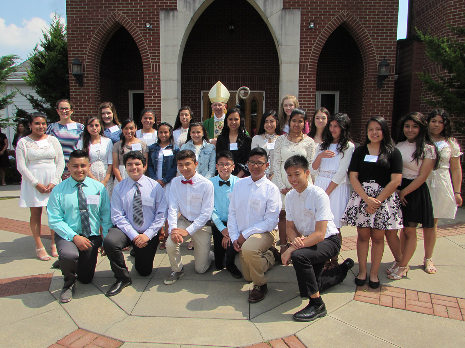 WAYNESVILLE — Bishop Peter Jugis recently conferred the sacrament of confirmation on young people during Mass at St. John the Evangelist Church. (Della Sue Bryson | Catholic News Herald)