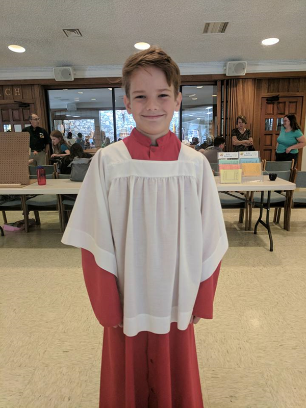 William Edward at altar serving training the Saturday before the accident.