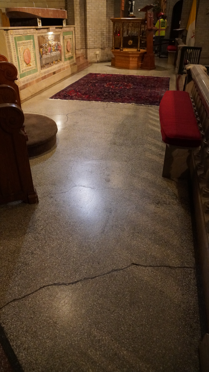 Cracks are also present in the terrazzo floors.
