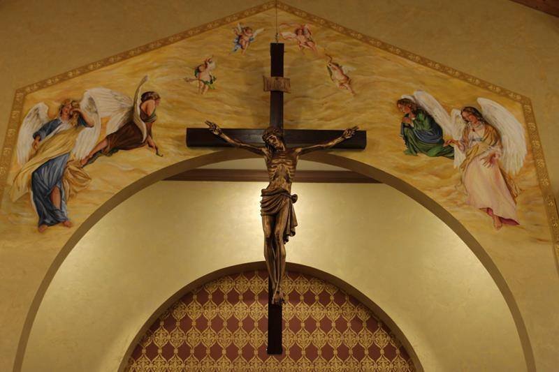 “Look to the angels surrounding the crucifix. Hear the words from the Letter to the Hebrews… ‘You have approached Mount Zion, the City of the Living God, the Heavenly Jerusalem and countless angels in festal gathering…’”