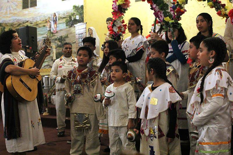 MONROE — Parishioners at Our Lady of Lourdes Church celebrated the feast of Our Lady of Guadalupe Dec. 12 with singing, traditional dances and a Mass that evening offered by Father Benjamin Roberts, pastor. (Photos by SueAnn Howell | Catholic News Herald)