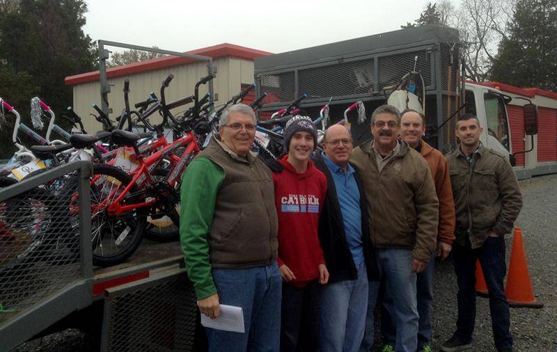 CHARLOTTE — Volunteers from Acosta Sales and Marketing and St John Neumann Church in Charlotte brought Christmas cheer to children at the Ivory-Baker Center in Charlotte Dec. 8 with their 28th Oper-ation Santa’s Helpers program. 