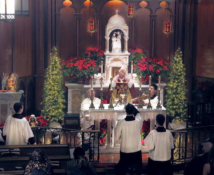 TRYON — On Christmas Eve, St. John the Baptist Church in Tryon offered three Masses, including the one pictured with Father Jason Christian. 