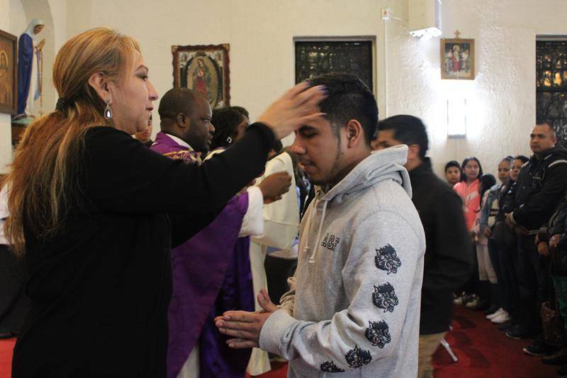 WINSTON-SALEM — St. Benedict the Moor observed the beginning of Lent on Ash Wednesday with a bilingual mass with Father Moses Njoh.. (Photo provided by Gloria Wilson)