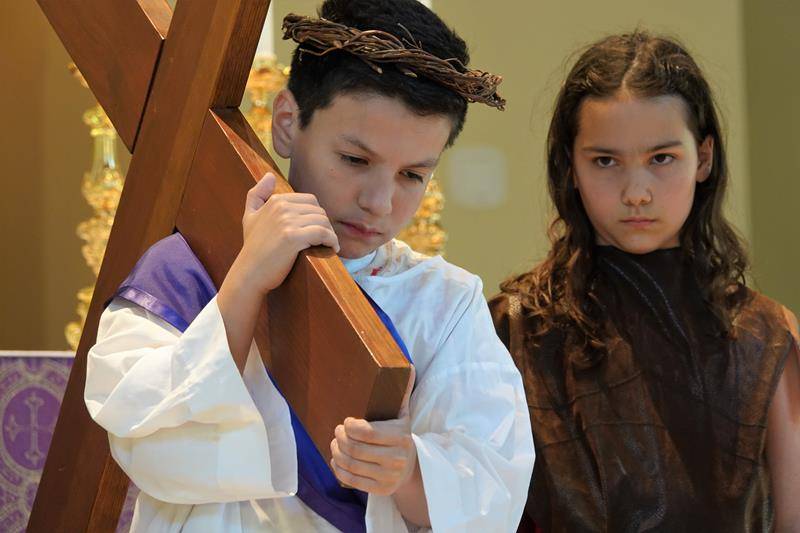 HUNTERSVILLE — St. Mark Catholic School students perform a living presentation of the Stations of the Cross. (Photo provided by Amy Burger) 