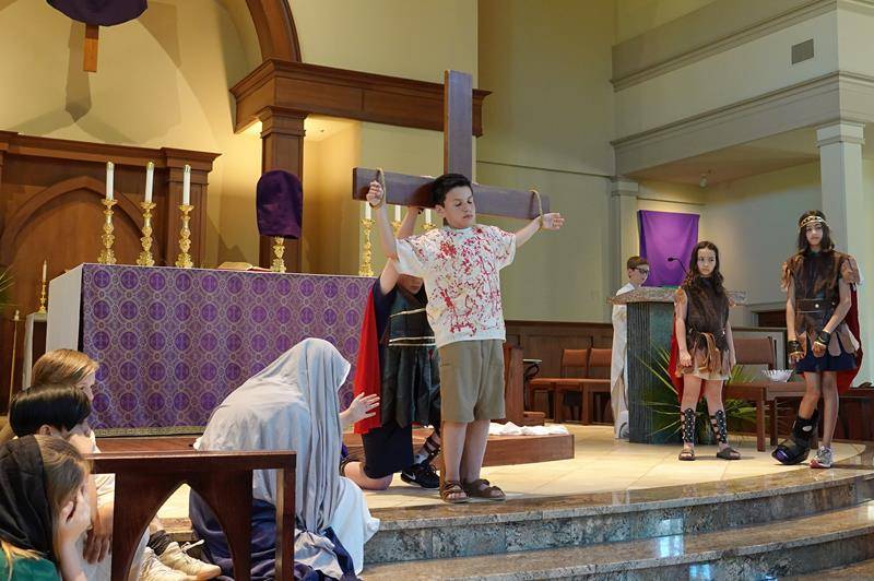 HUNTERSVILLE — St. Mark Catholic School students perform a living presentation of the Stations of the Cross. (Photo provided by Amy Burger) 