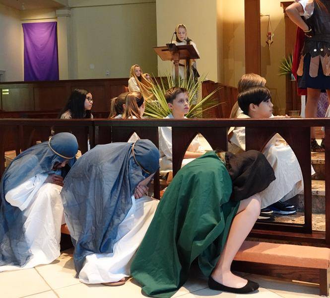 HUNTERSVILLE — St. Mark Catholic School students perform a living presentation of the Stations of the Cross. (Photo provided by Amy Burger) 