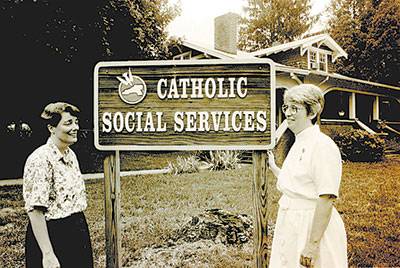 Sister Mary Barnard and Sister Mary Frechette, MSBT, are pictured outside the Asheville office of what was then called Catholic Social Services. (Photos courtesy of Diocese of Charlotte Archives)