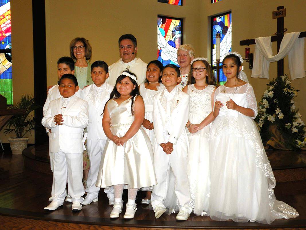 Eight children at Immaculate Heart of Mary Mission in Hayesville received their first Holy Communion at Mass May 19. (Victoria Ewing Ware | Catholic News Herald)